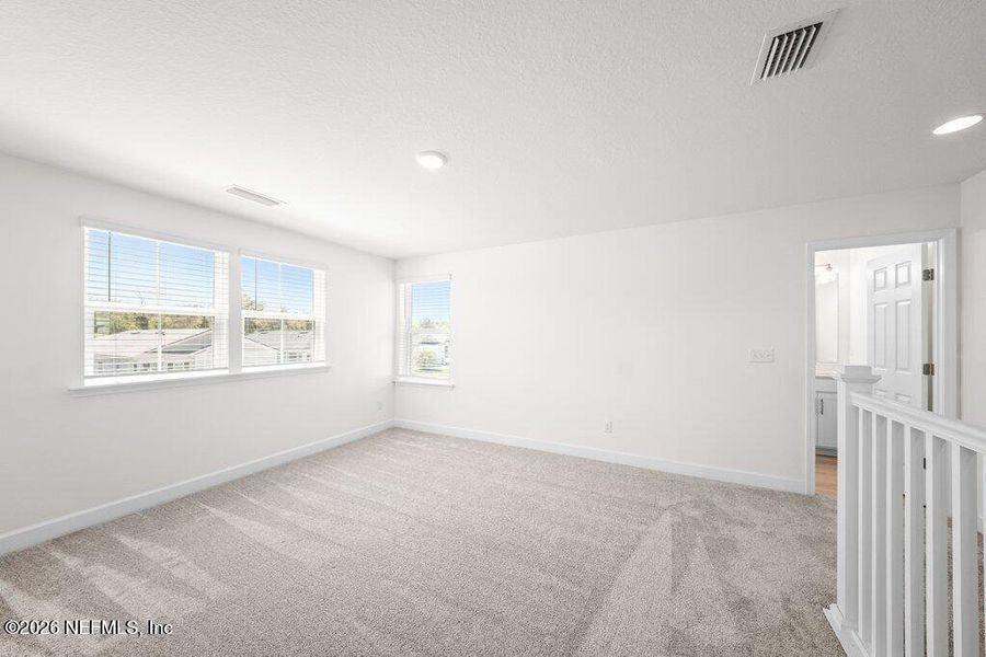 Spacious, unfurnished interior of a new home in Verano Creek, St. Augustine (Image 28).