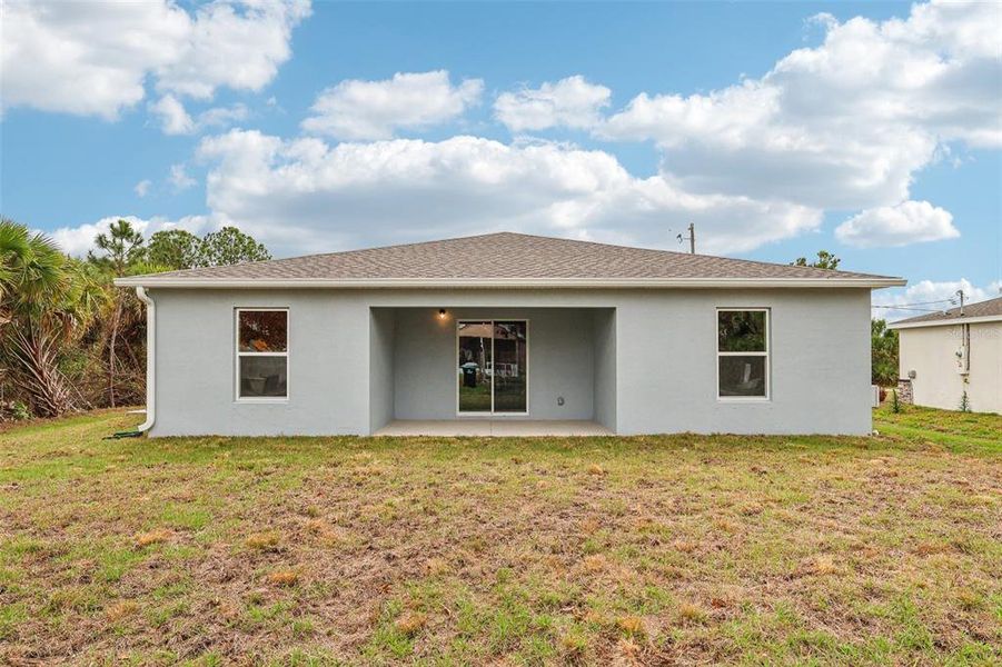 Exterior details and patio area of a home in Palm Bay Classic, Palm Bay (Image 4).