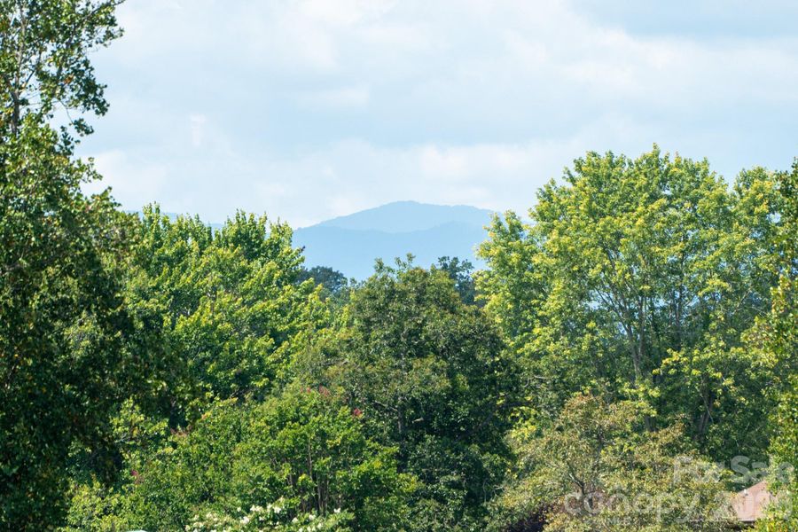 A peek-a-boo mountain in the distance. A peek-a-boo mountain in the distance.