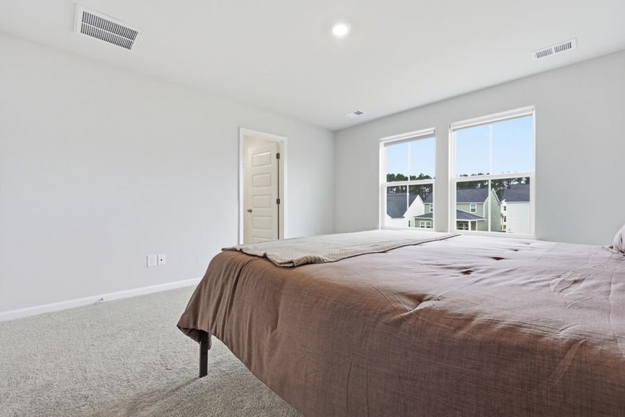 Furnished interior view inside a new home in Sweetgrass at Summers Corner: Carolina Collection, Summerville (Image 21).