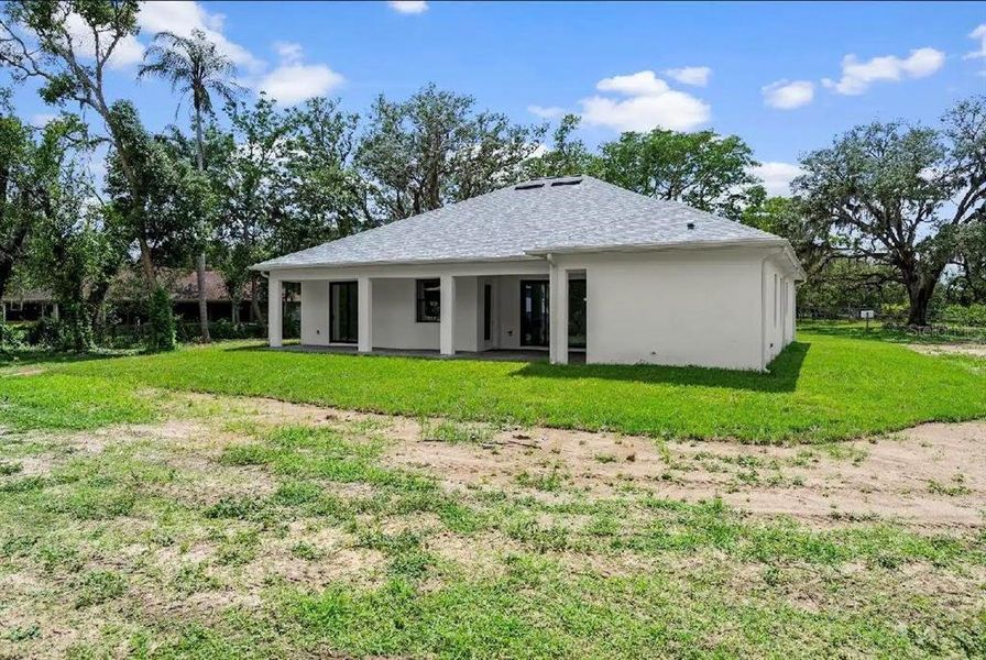 Exterior details and patio area of a home in , New Port Richey (Image 31).
