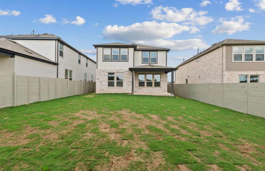 Exterior details and patio area of a home in Wolf Ranch, Georgetown (Image 20).