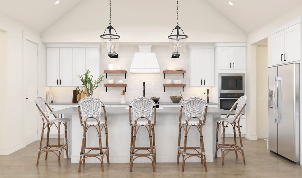 Kitchen with pendant lights & vast island