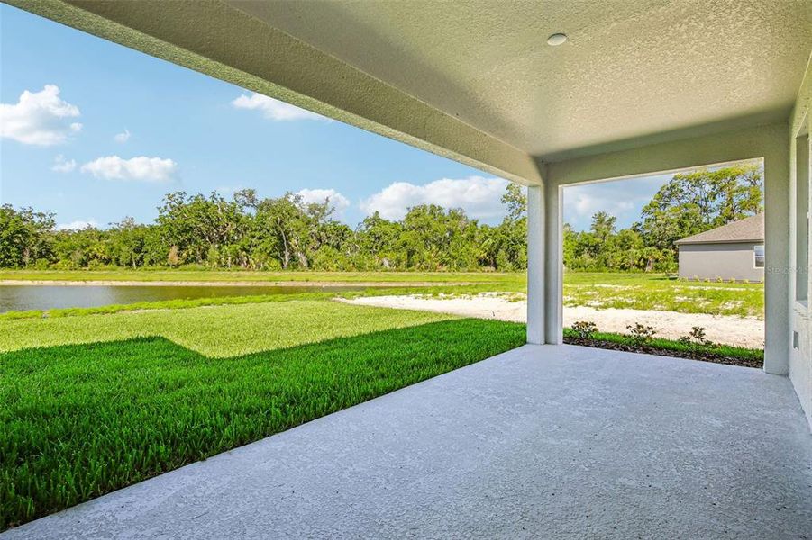 Exterior details and patio area of a home in Oakfield Trails, Parrish (Image 4).