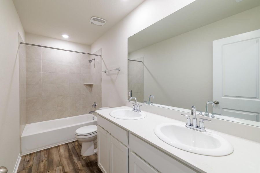 Furnished interior view inside a new home in , Manor (Image 15).