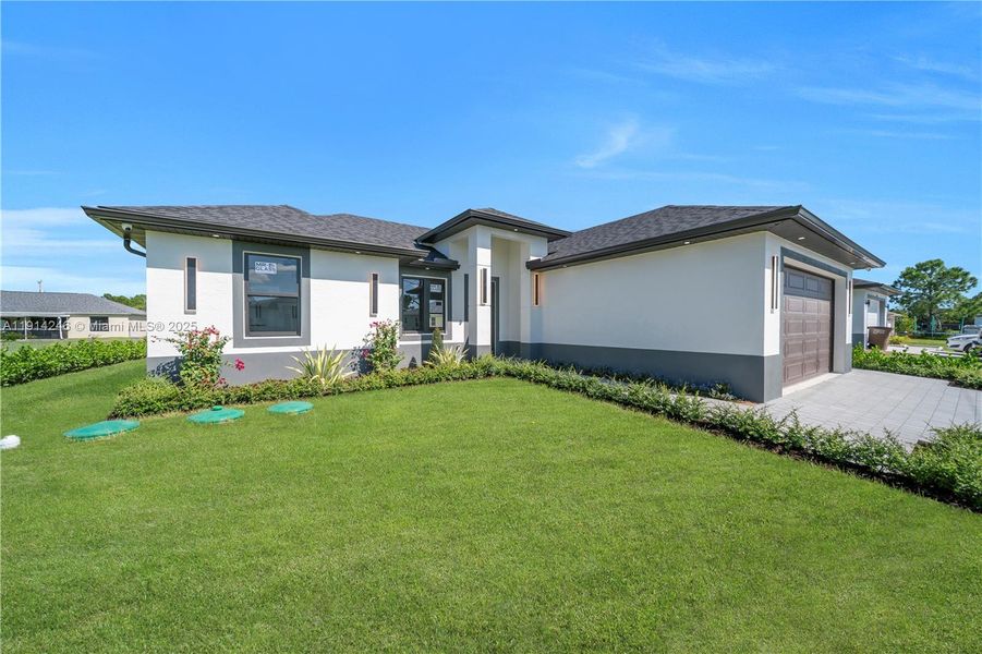 Exterior details and patio area of a home in , Lehigh Acres (Image 4). Exterior details and patio area of a home in , Lehigh Acres (Image 4).