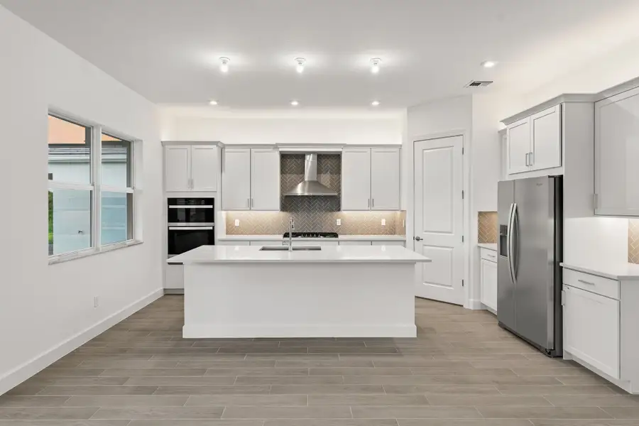 Furnished interior view inside a new home in Tradition, Port St. Lucie (Image 3).