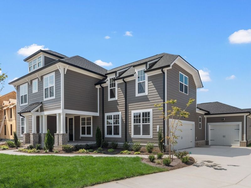 Front exterior of a new home in Shelton Square, Murfreesboro, TN, highlighting curb appeal (Image 29). Front exterior of a new home in Shelton Square, Murfreesboro, TN, highlighting curb appeal (Image 29).