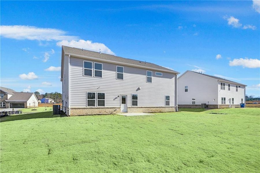 Front exterior of a new home in Anderson Point Estates, McDonough, GA, highlighting curb appeal (Image 16).