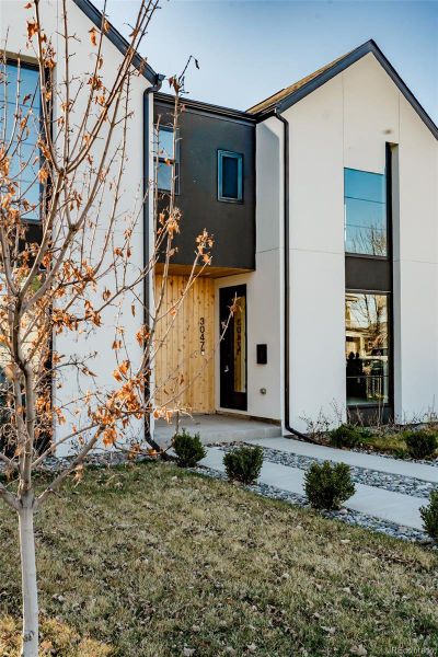 Exterior details and patio area of a home in , Englewood (Image 26).