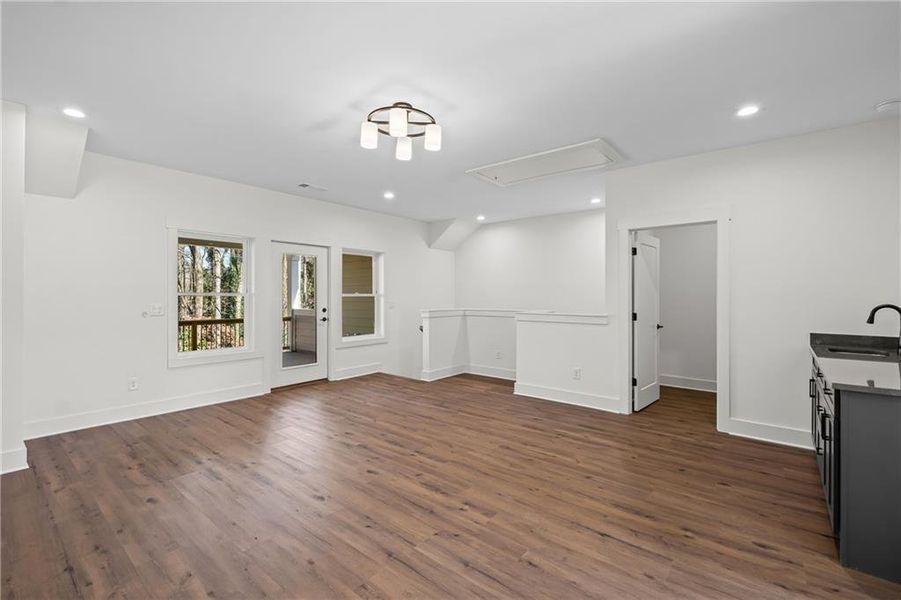Spacious, unfurnished interior of a new home in Devin's Shire - A Kennesaw Tradition, Kennesaw (Image 28).