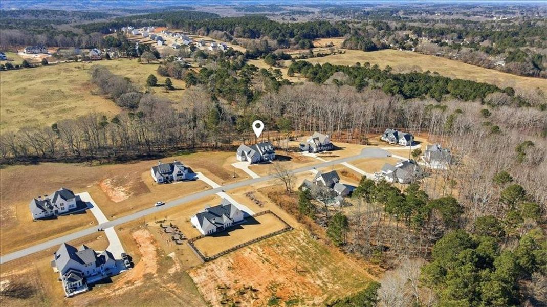 Front exterior of a new home in Old Town Estates, Dacula, GA, highlighting curb appeal (Image 31). Front exterior of a new home in Old Town Estates, Dacula, GA, highlighting curb appeal (Image 31).