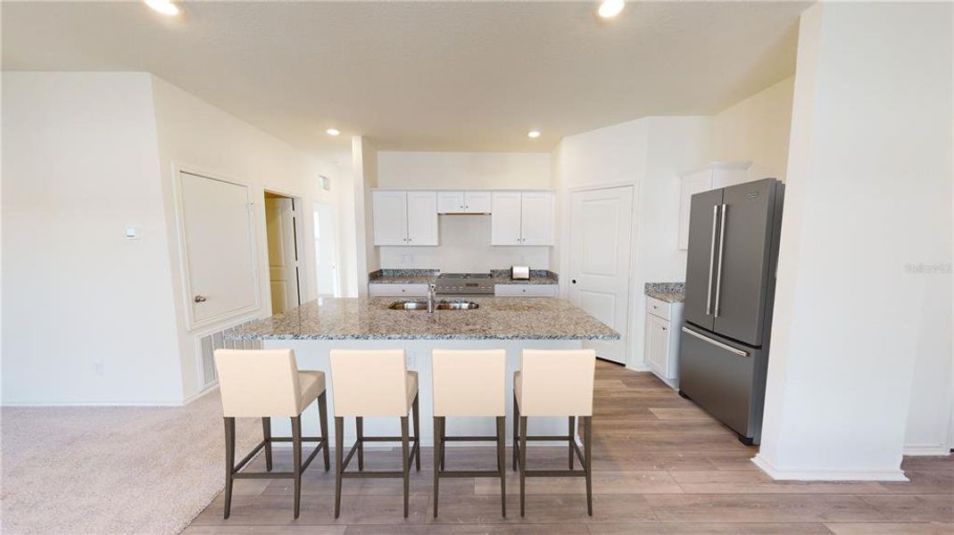 Furnished interior view inside a new home in Vista Walk, Dade City (Image 3).