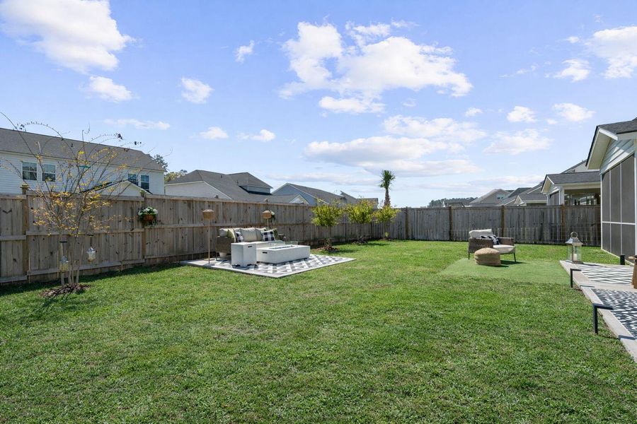 Exterior details and patio area of a home in Sweetgrass at Summers Corner, Summerville (Image 26).