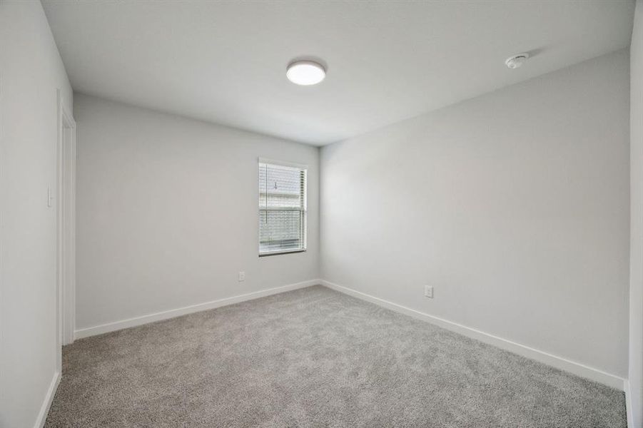 Bedroom in the Hadley home plan by Trophy Signature Homes – REPRESENTATIVE PHOTO Bedroom in the Hadley home plan by Trophy Signature Homes – REPRESENTATIVE PHOTO