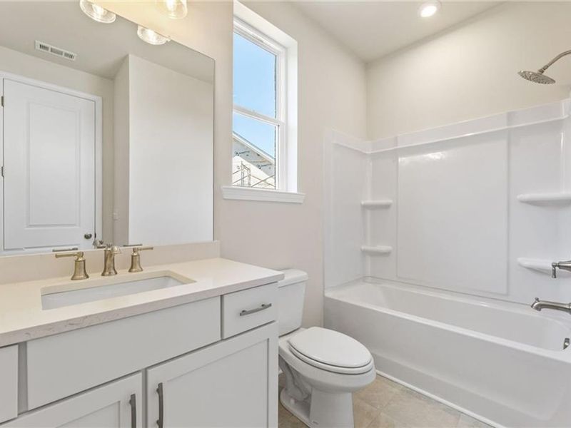 Furnished interior view inside a new home in Melody Lakeside Estates, Buford (Image 2).