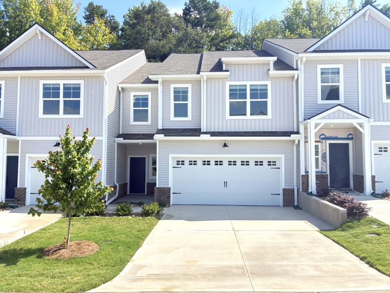 Front exterior of a new home in Miller Park, Greenville, SC, highlighting curb appeal (Image 1). Front exterior of a new home in Miller Park, Greenville, SC, highlighting curb appeal (Image 1).