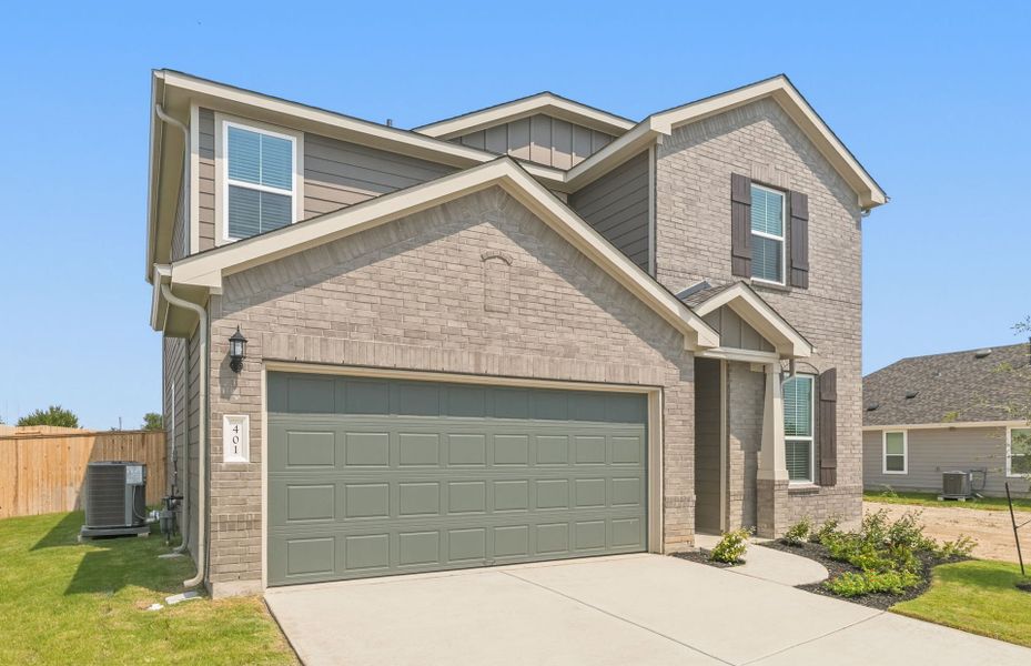 Front exterior of a new home in Patterson Ranch, Georgetown, TX, highlighting curb appeal (Image 22).