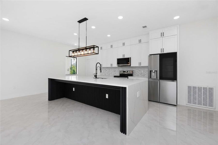 Furnished interior view inside a new home in , Port Charlotte (Image 11).