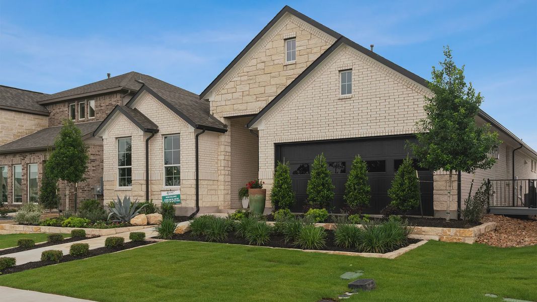 Front exterior of a new home in Nolina, Georgetown, TX, highlighting curb appeal (Image 21).