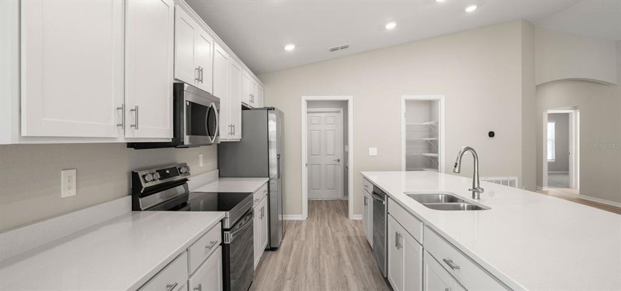 Furnished interior view inside a new home in VillaMar, Winter Haven (Image 7).