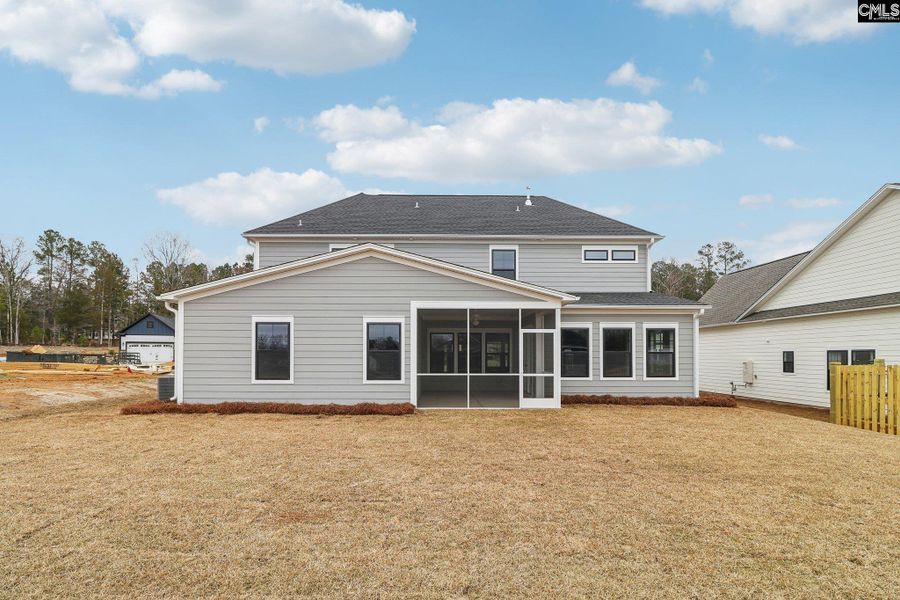 Exterior details and patio area of a home in Collins Cove, Chapin (Image 16). Exterior details and patio area of a home in Collins Cove, Chapin (Image 16).