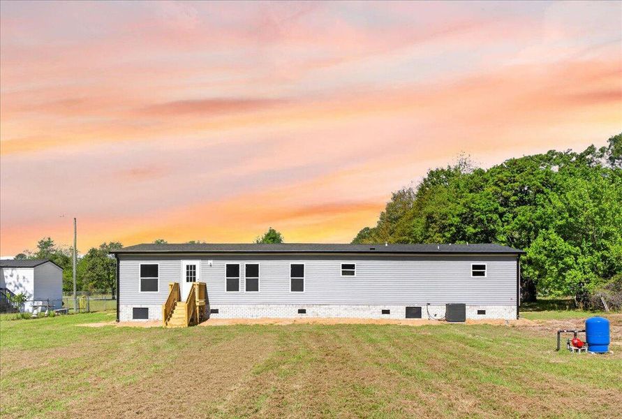Exterior details and patio area of a home in , Cross (Image 2). Exterior details and patio area of a home in , Cross (Image 2).