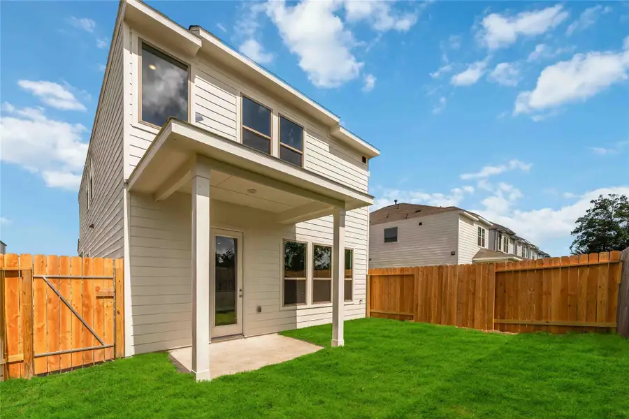 Front exterior of a new home in Cay Landing, Houston, TX, highlighting curb appeal (Image 1). Front exterior of a new home in Cay Landing, Houston, TX, highlighting curb appeal (Image 1).