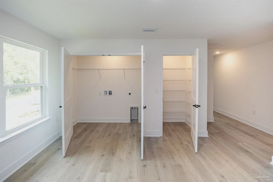 Spacious, unfurnished interior of a new home in Parkland Place, Pace (Image 16).