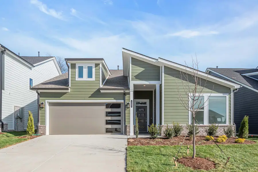 Representative exterior photo of a completed home built from the The Ginger by David Weekley Homes in Nexus – Village Collection, Gallatin, TN (Image 1).