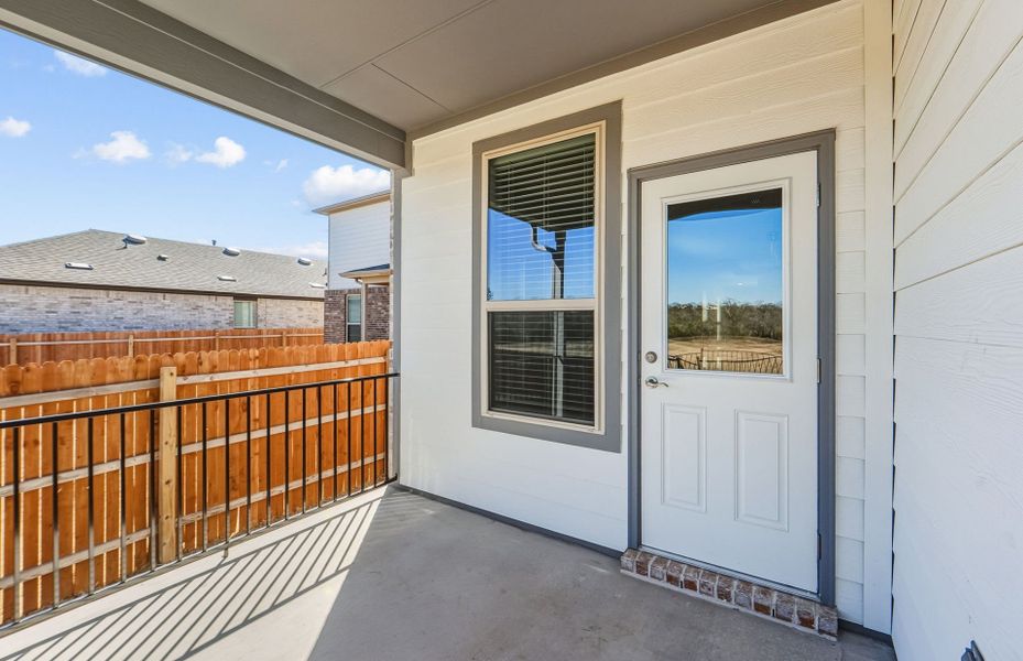 Exterior details and patio area of a home in Saddleback at Santa Rita Ranch, Liberty Hill (Image 24).