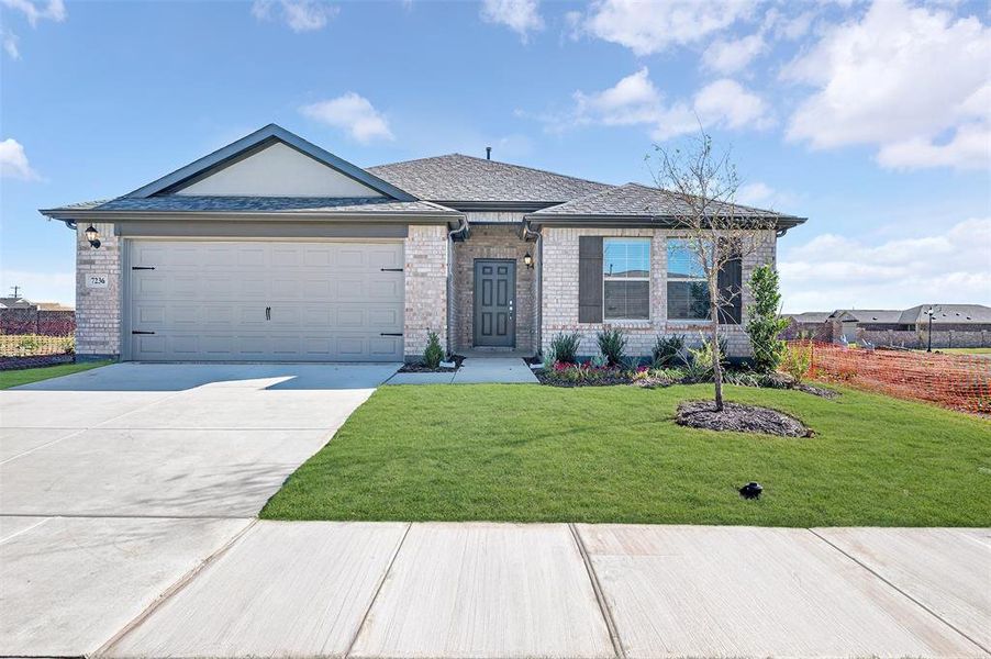Front exterior of a new home in Mobberly Farms, Pilot Point, TX, highlighting curb appeal (Image 2). Front exterior of a new home in Mobberly Farms, Pilot Point, TX, highlighting curb appeal (Image 2).