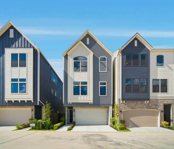 Front exterior of a new home in Spring Valley Creek, Houston, TX, highlighting curb appeal (Image 1).