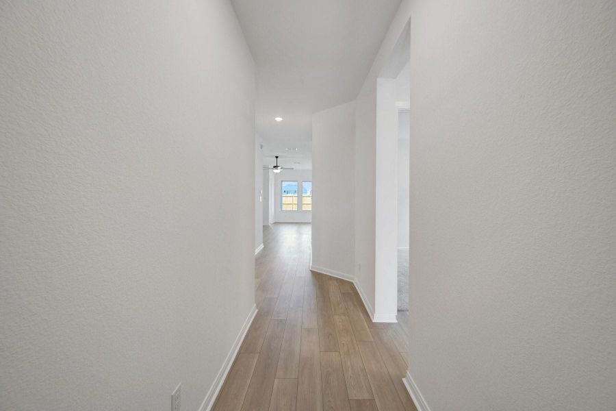 Spacious, unfurnished interior of a new home in Meridiana - Terrace Collection, Manvel (Image 12).