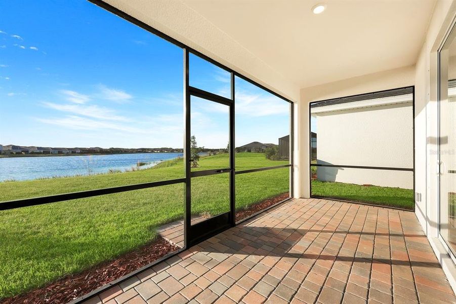 Exterior details and patio area of a home in Hampton Lakes at River Hall, Alva (Image 17).