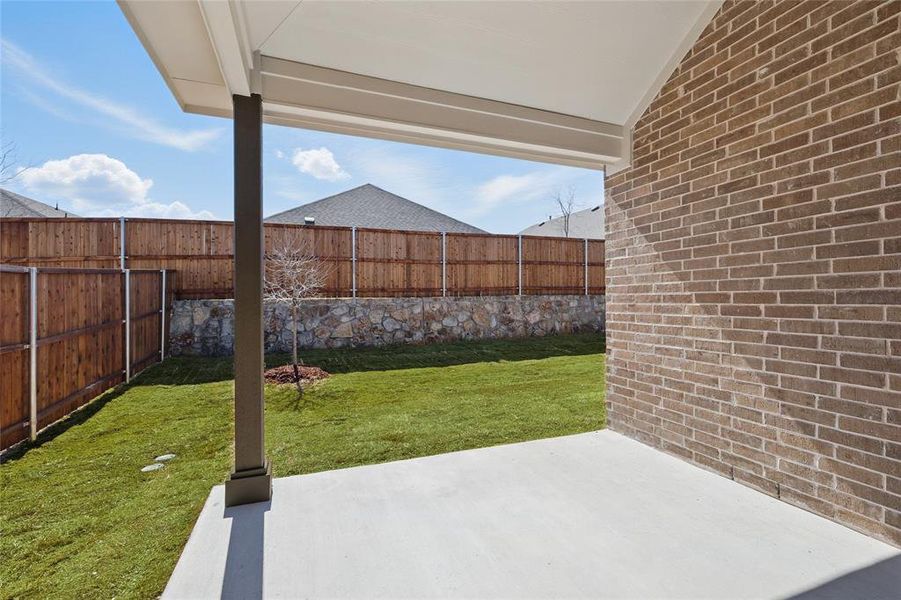 View of patio featuring a fenced backyard