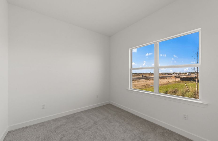 Spacious, unfurnished interior of a new home in TerraWalk at Babcock Ranch, Alva (Image 18).