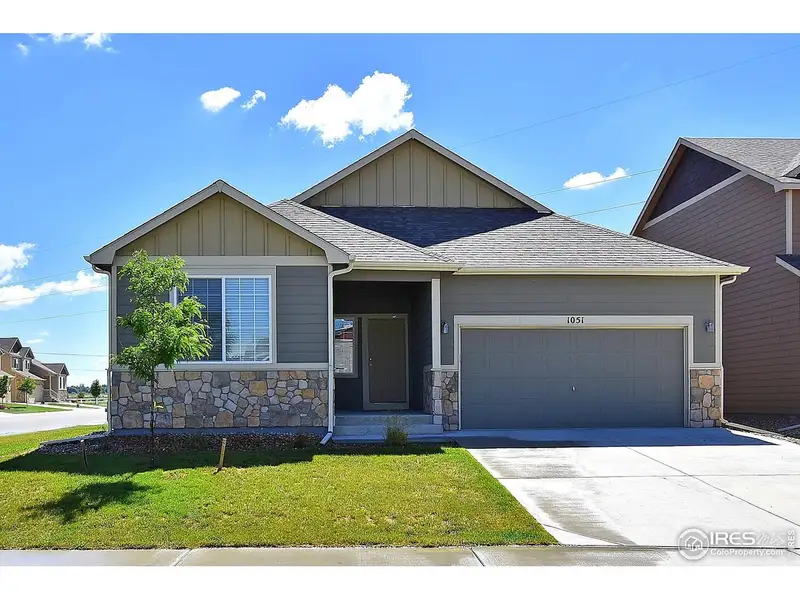Front exterior of a new home in , Johnstown, CO, highlighting curb appeal (Image 2). Front exterior of a new home in , Johnstown, CO, highlighting curb appeal (Image 2).