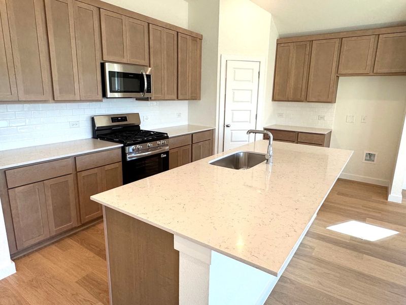 Furnished interior view inside a new home in Prairie Winds, Hutto (Image 4).
