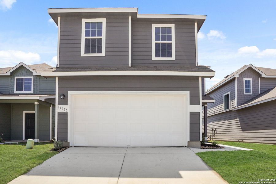 Front exterior of a new home in Abbott Place, St. Hedwig, TX, highlighting curb appeal (Image 19).