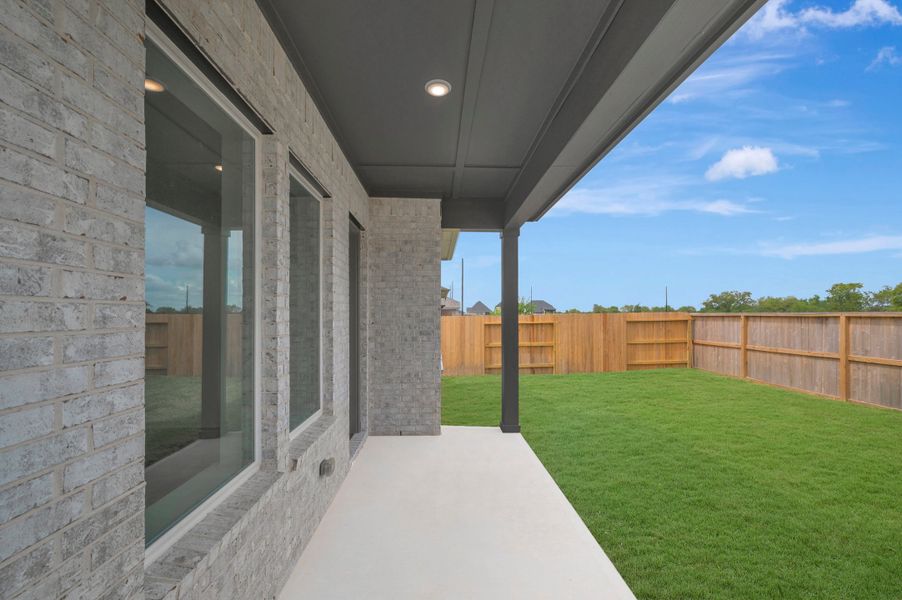 Exterior details and patio area of a home in The Grand Prairie - Meadow Collection, Hockley (Image 4). Exterior details and patio area of a home in The Grand Prairie - Meadow Collection, Hockley (Image 4).