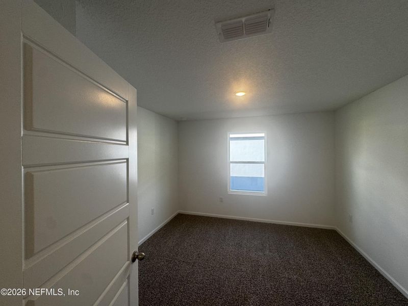 Spacious, unfurnished interior of a new home in The Arbors, Jacksonville (Image 37).