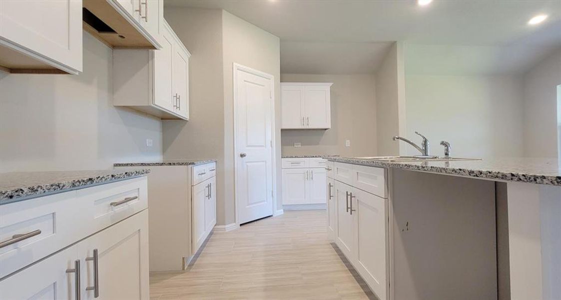 Furnished interior view inside a new home in Highlands at Chapel Creek, Fort Worth (Image 6). Furnished interior view inside a new home in Highlands at Chapel Creek, Fort Worth (Image 6).