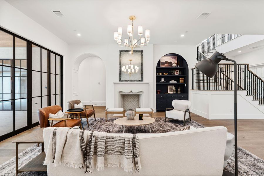 Living Room and fireplace with a custom designed bookshelf