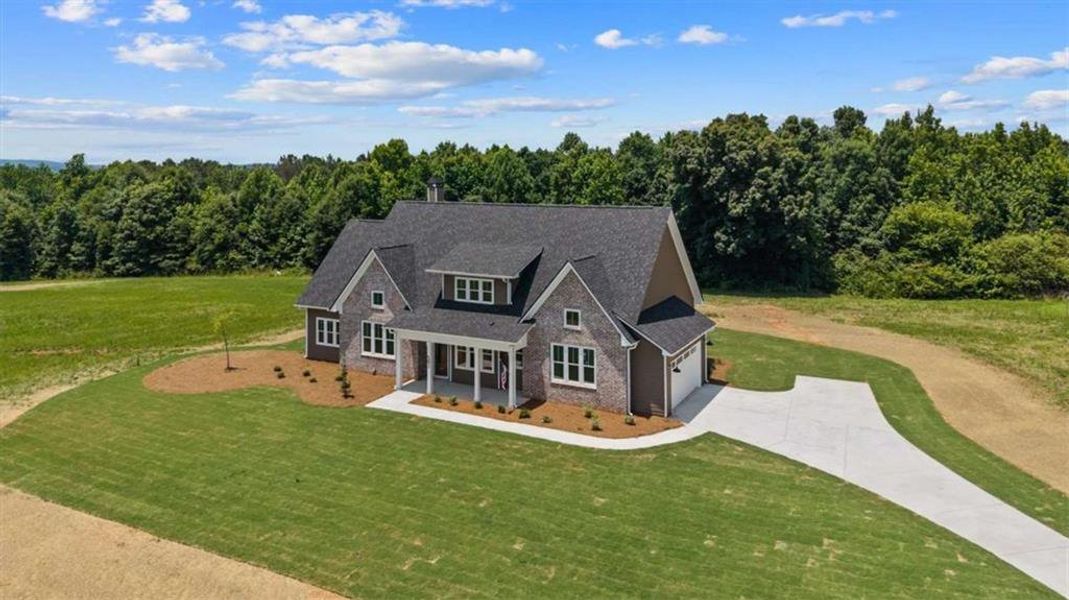 Front exterior of a new home in , Roopville, GA, highlighting curb appeal (Image 28).