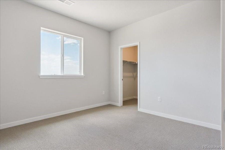 Spacious, unfurnished interior of a new home in Trails at Smoky Hill, Parker (Image 19).