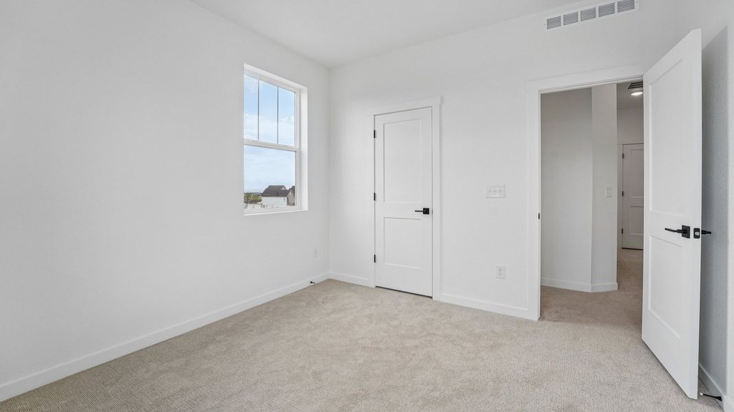Furnished interior view inside a new home in Westerly, Erie (Image 27).