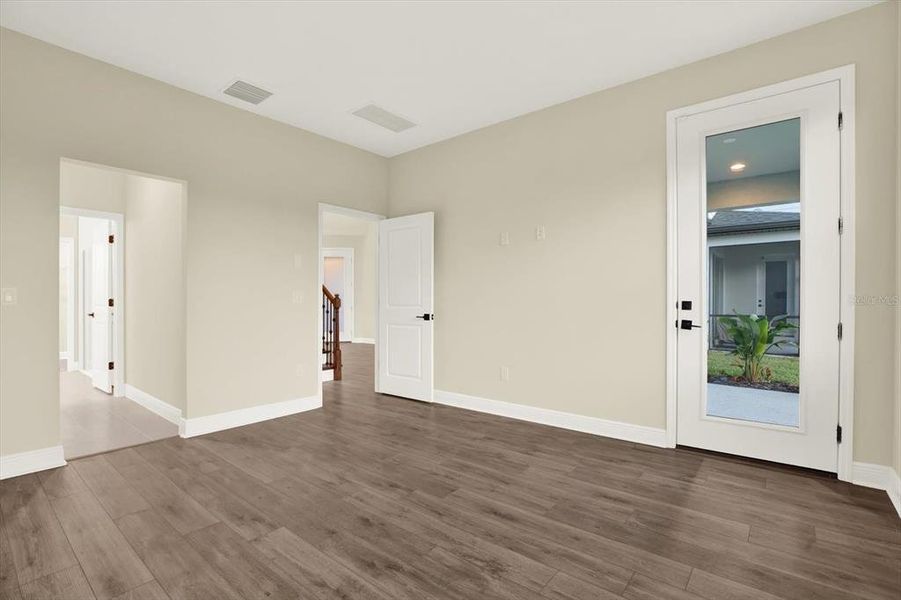 Spacious, unfurnished interior of a new home in The Towns At Long Bayou, Seminole (Image 28).