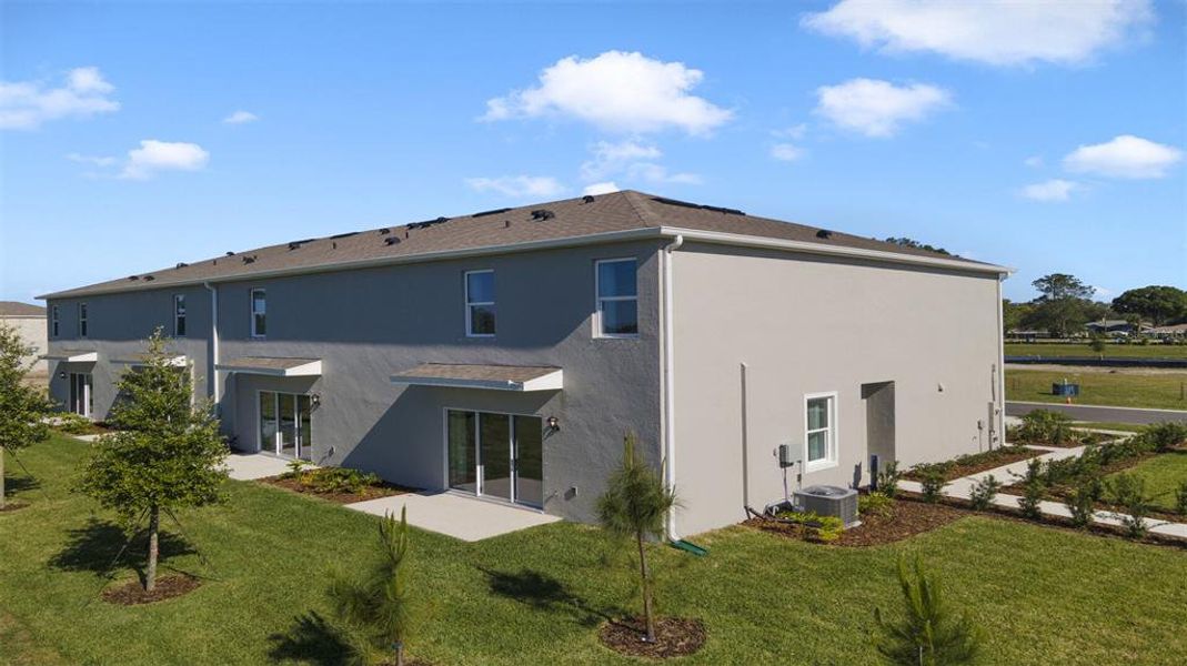 Exterior details and patio area of a home in Rivers Edge, Edgewater (Image 2).