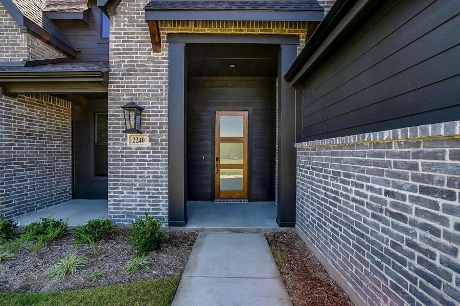 Representative exterior details of a home built from the The Blaire by Elmwood Custom Homes in Hidden Lakes on Mockingbird, Midlothian (Image 9). Representative exterior details of a home built from the The Blaire by Elmwood Custom Homes in Hidden Lakes on Mockingbird, Midlothian (Image 9).